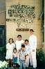 The Sanchez family poses outside the chapel before their baptism
