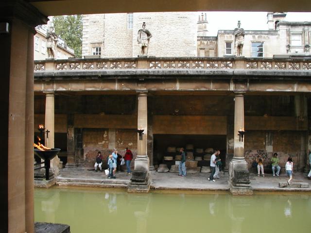 The Roman baths at Bath.  The lower parts of the columns were built by
Romans; after the baths were ruined, the Victorians rebuilt them and
joined their columns onto the Roman ones.  Everything above the
juncture is Victorian, including the statues of Romans.  Photo by
Xandie.