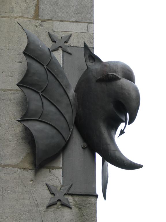 A gargoyle on a corner of the Aachen cathedral.