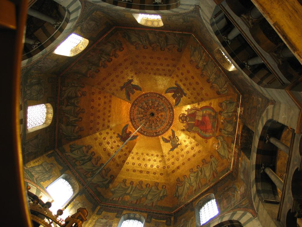 The interior of a room in the Aachen cathedral, shot looking straight up.