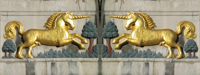 Detail of the sign over The Golden Unicorn (or literally, "To the Golden Unicorn"), a restaurant in the Aachen town square.