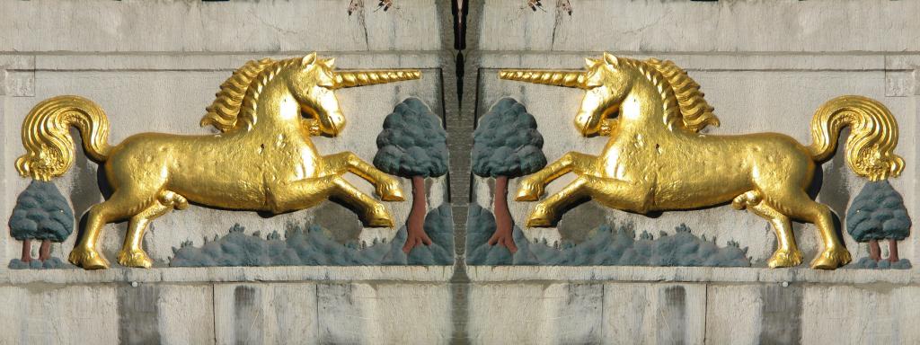 Detail of the sign over The Golden Unicorn (or literally, "To the Golden Unicorn"), a restaurant in the Aachen town square.
