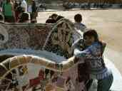 Xandie at the serpentine wall at Parc Guell.  Photo by Pat.