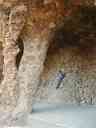 Xandie climbs an oddly inclined wall at Parc Guell.  Photo by Pat.