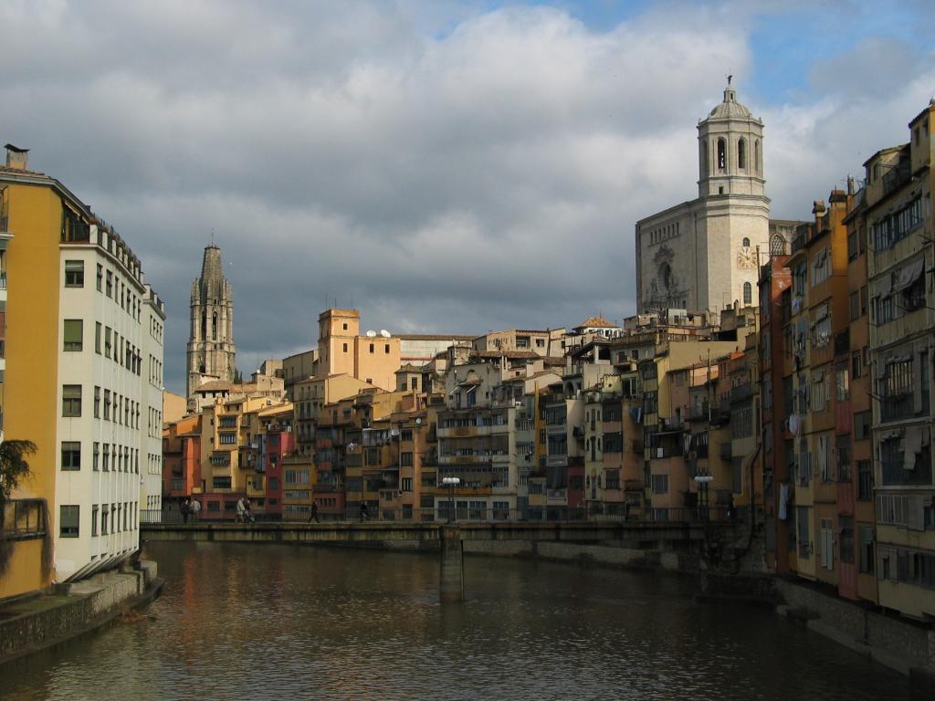 The river through Girona.  Despite its peaceful appearance, it was very swift-flowing.  On the right, you can see the main Girona cathedral, which we visited (and in which we froze).  On the left is the tower of another cathedral, but one was enough for us.