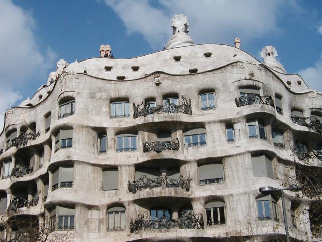A Gaudi-designed building in Barcelona.  The curves are intended to suggest the waves of the ocean; the balcony railings are like seaweed. Photo by Pat.