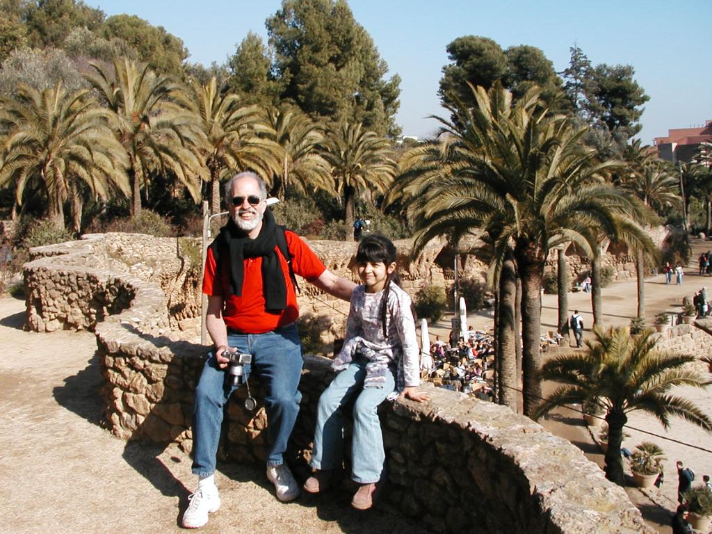 Geoff and Xandie atop a Gaudi-designed stone wall at Parc Guell.