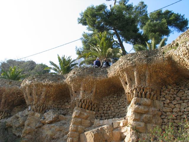 The Gaudi-designed stone wall at the edge of the Parc Guell plaza.