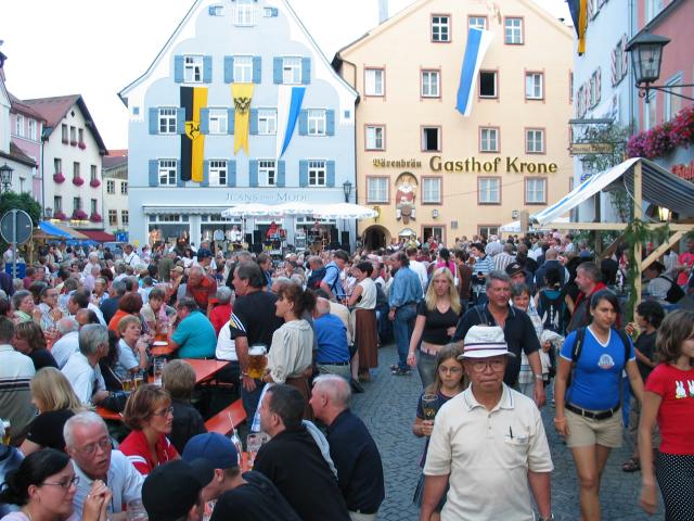 When we turned the corner to our second hotel in Fssen (the one that
we had actually reserved), this is the scene that greeted us.
You can't really see from the picture, but there are many long tables
full of beer-drinking revelers.  Fortunately, the whole show closed
down at about 10:30 (it was Sunday night, after all), so we didn't
really lose any sleep.