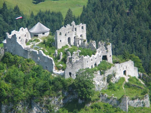 The Ehrenberg ruins, viewed from the Schlokopf.  The last time I
visited, the smaller ruins were not visible from the larger.  This
picture clearly shows the incongruity of the modernized building with
the conical roof.  It also gives a much better feel for the layout of
the smaller castle that can be gained by wandering around within it.