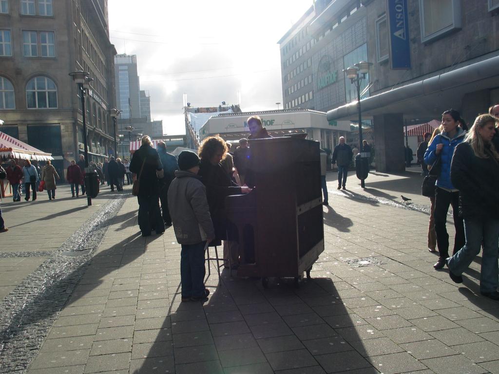 A street musician with an unusual (for the street) instrument in Essen.