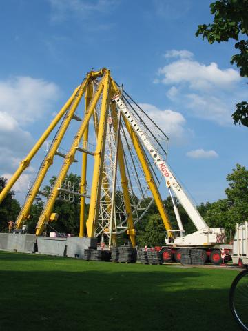 Pulling three ribs out with the crane.  It's a very tight fit.  They
have about eight feet of up/down clearance, and of course a very
narrow gap at the top.