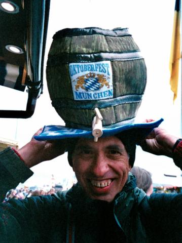 Geoff tries on a proper Oktoberfest beer hat (scanned from a photo by Pat).