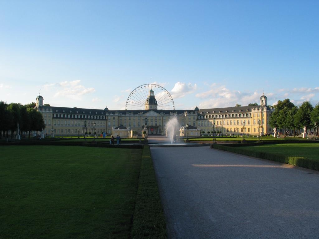 This is the Karlsruhe palace (Schloss Karlsruhe), taken from the side
that faces our apartment.  Behind the tower is the largest portable
Ferris Wheel in the world.