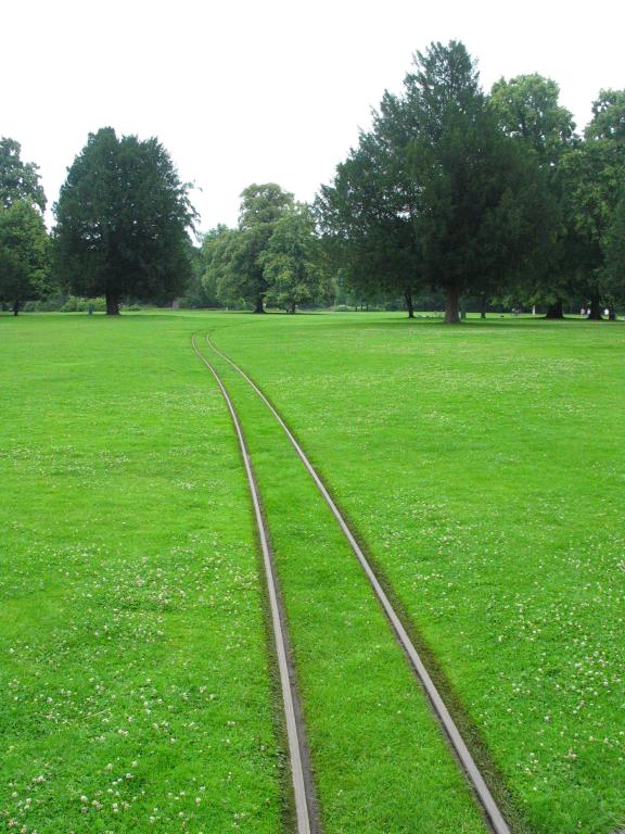 The tracks of the mini-train that runs through the Karlsruhe palace
park.  The visible tracks represent perhaps 30 seconds of a 15-minute
trip; nevertheless, they give an idea of the scale and beauty of the
park.