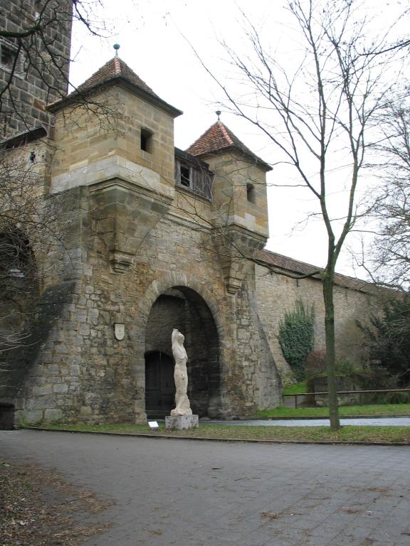 One of the gates in the Rothenburg city wall.  Pat liked the architecture.  Xandie liked the towers.  I liked the naked lady.