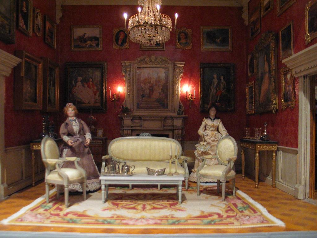 A sitting room in the mansion dollhouse (Xandie called it a palace) in the Rothenburg toy and doll museum.  Xandie says that the doll on the right is a princess and the one on the left is a maid.  All of the rooms were extremely well appointed.