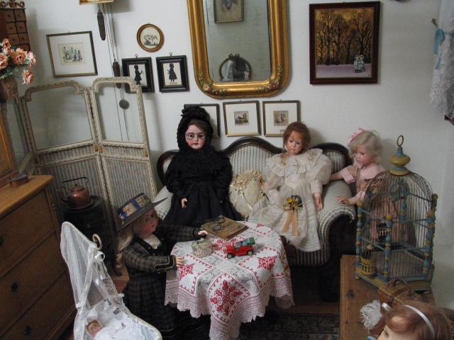 Nearly life-sized dolls in the Rothenburg toy and doll museum.  It is difficult to give a scale in this picture, save to say that I was holding the camera to my eye while standing, and the display is placed on the floor (in a little room of its own).