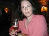 Pat enjoying a pint in her grandfather's favorite pub.  Photo by
Xandie.