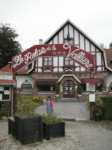 Xandie in front of our quaint Belgian hotel.  Photo by Pat.