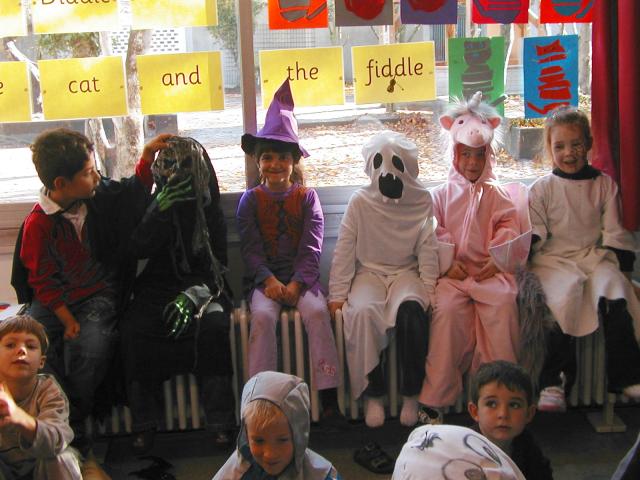 Xandie and Mrs. McLean's first-grade class at their Halloween party.