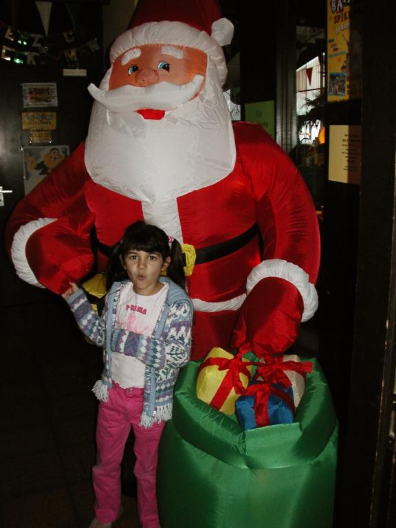 Xandie and an inflatable Santa at an indoor "Spielpark" (playpark).
(Color-adjusted: ggamma = 0.9, bgamma = 0.8.)