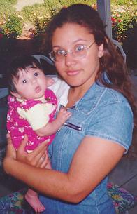 With her good friend Alyssa