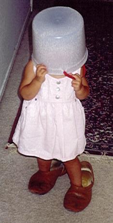 With a bucket over her head