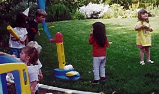 Playing games at her
	  birthday party