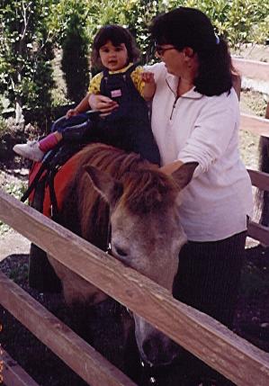 With Mommy on a horse