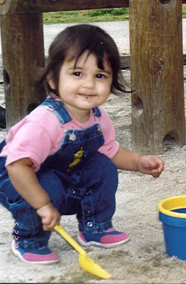 Digging in the sand at the playground