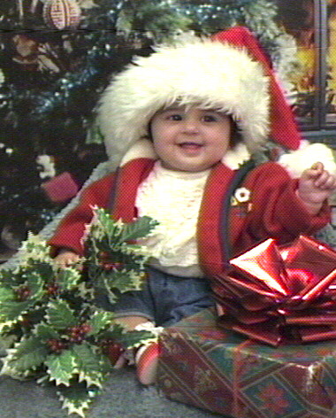 Posed in a Santa hat