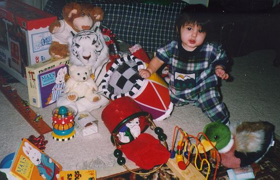 With a pile of toys