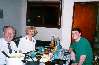 Elder and Sister Stewart at the table in our apartment with yours truly