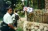 Elder Barrett gets a little too close to a leopard in the La Plata zoo as Elder Mehr looks on