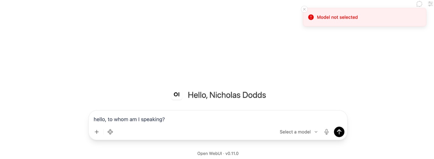 Open WebUI chat screen showing a Model not selected error banner and a Select a model control
